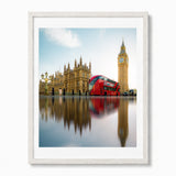 A London wall art print featuring Big Ben, Westminster Palace and iconic red bus, presented in a white frame