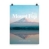 An unframed photographic print featuring mount fuji reflected over water and decorative text showing the word "Mount Fuji" and the coordinates.