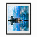 Framed wall art featuring the Singapore city skyline reflection print, Marina Bay Sands and a glowing Ferris wheel, shown in a black frame.