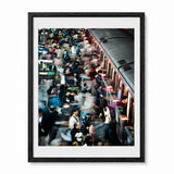 A framed photographic print of a crowded train station in Tapei, Taiwan. The print is shown in a black frame.