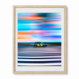 Framed wall art print featuring a tokyo taxi in profile against a vivid abstract background of horizontal light streaks in blue, purple, pink, orange, and white, shown in a light wood frame on a light gray background.