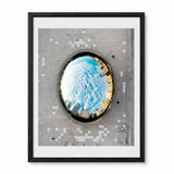 Framed wall art featuring an aerial photograph of The Bean sculpture in Chicao, a circular mirror reflecting the Chicago city skyline over a tiled plaza, presented in a black frame.