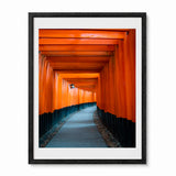 A photograph of Kyoto Japan's red Torii Gates framed in a black frame