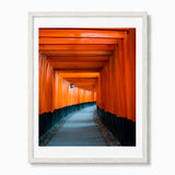 A photograph of Kyoto Japan's red Torii Gates framed in a white frame
