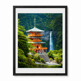A framed art print depicting a Japanese pagoda nestled in lush green forest next to a tall waterfall, presented in a black frame with a white mat on a white background.