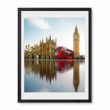 A London wall art print featuring Big Ben, Westminster Palace and iconic red bus, presented in a black frame