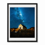 Framed wall art featuring church of the good shepherd in New Zealand in a night astro-photograph, shown in a black frame.