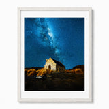 Framed wall art featuring church of the good shepherd in New Zealand in a night astro-photograph photograph, shown in a white frame.