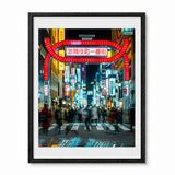 Framed wall art featuring people walking in Shinjuku Tokyo at night and neon signs in the background, shown in a black frame.
